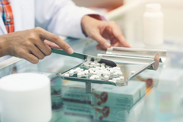 Picture of pharmacist scanning a medication